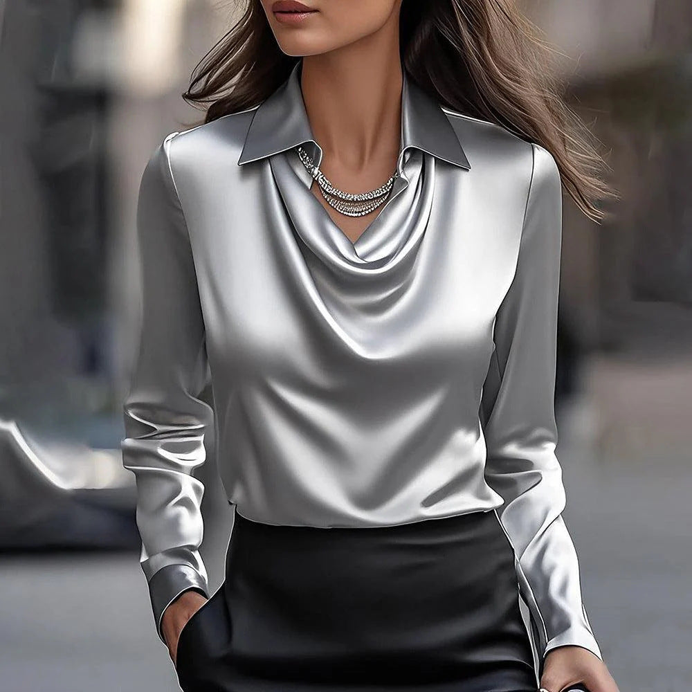 Stylish woman wearing Women's Swing Collar Draped Shirts in silver color, featuring a cowl neck and a chic collar.